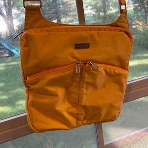 Baggalini canyon crossbody NWT marigold yellow